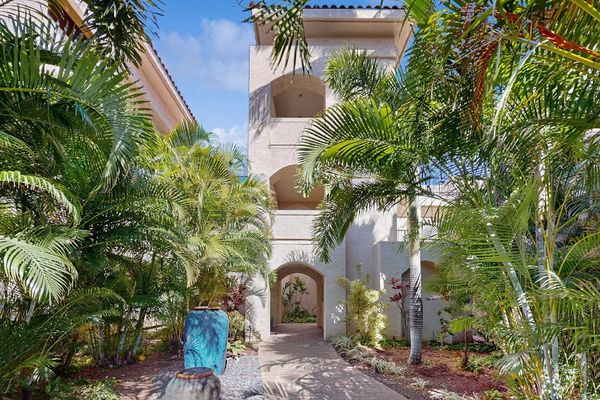 Tropical Courtyard Entrance & Arched Architectural Tower
