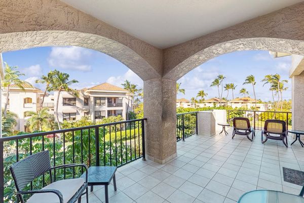 Covered Arched Balcony with Seating & Resort Views