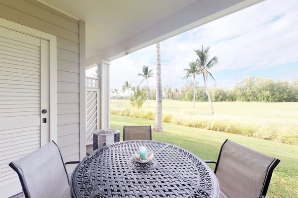 Covered lanai with peaceful garden views