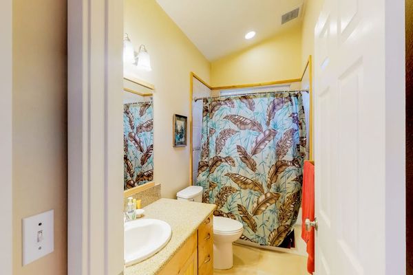 Bright Full Bathroom With Shower Tub