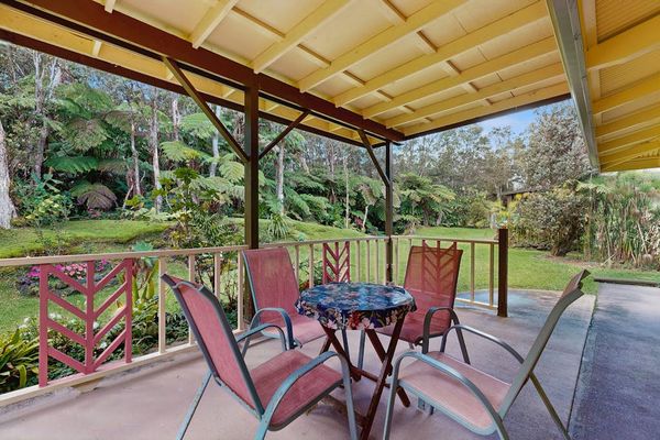 Covered Lanai Dining Table with Scenic Garden Views