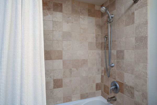 Walk-in shower with elegant tile finishes