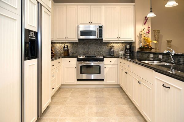Full Kitchen Layout with Stainless Steel Appliances & Granite Counters