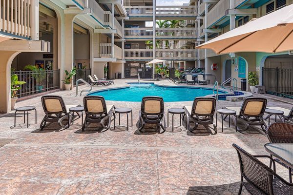 Soak Up The Sun On The Relaxing Pool Deck