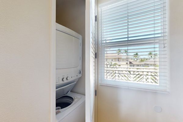 In-Unit Stacked Washer & Dryer Closet