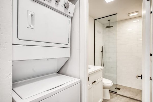 Convenient In-Unit Stacked Laundry Makes Beach Trips Effortless