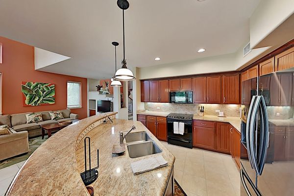 Large open state of the art and fully stocked kitchen.