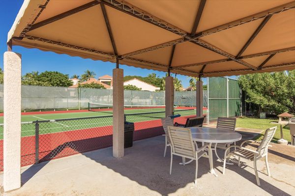 Shaded Poolside Pavilion For Outdoor Gatherings