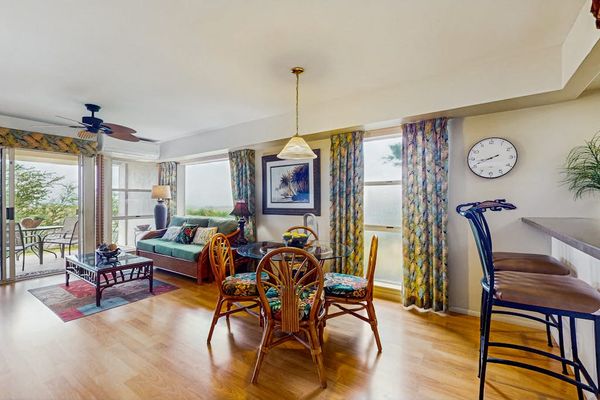 Comfortable living room with lanai access.
