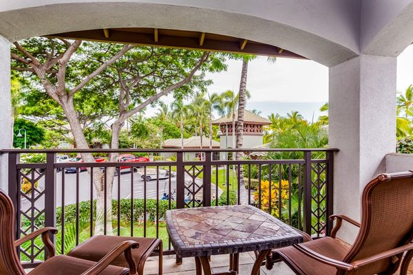 Covered Lanai Surrounded By Lush Greenery