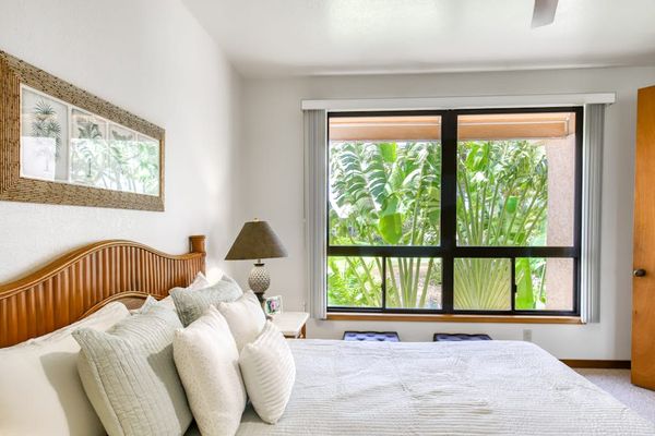 Peaceful Primary Bedroom With Garden Views