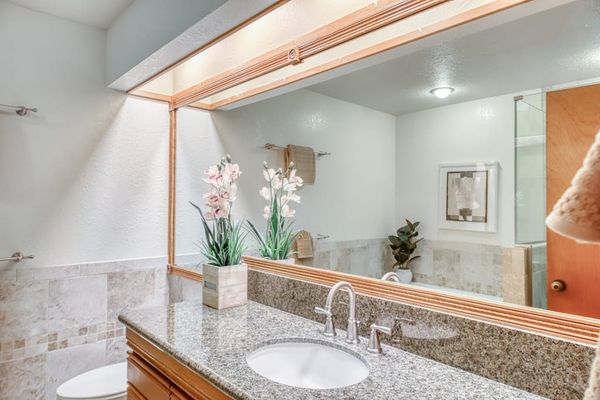 Elegant Vanity With Resort Inspired Finishes