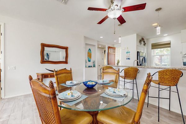 Sunlit Dining Space With Easy Kitchen Access
