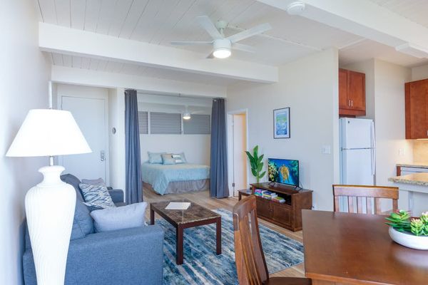 Comfortable Seating, Accent Lighting, Overhead Fan & Window Drapes