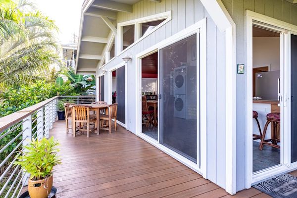 Sunlit Wraparound Deck featuring Outdoor Dining & Kitchen Access