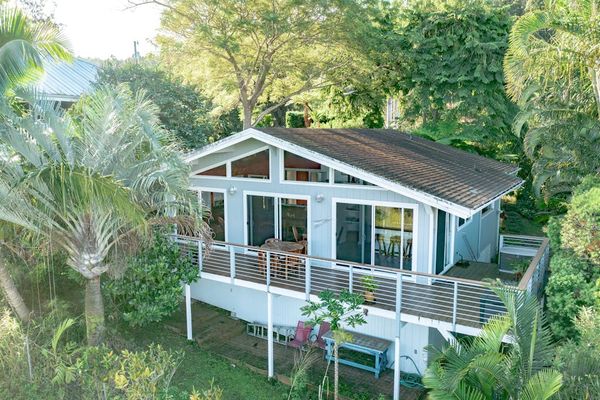 Full Aerial View of House Profile, Elevated Deck, & Tropical Canopy