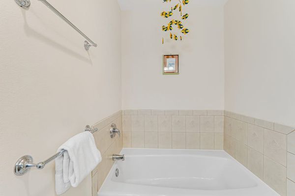 Master bedroom with double sinks, garden tub and walk in shower.