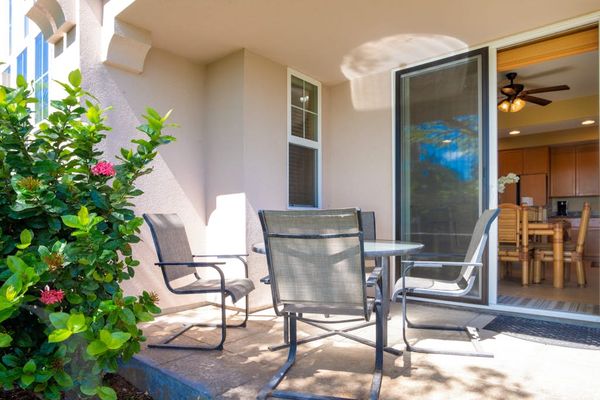 Relax on the private lanai surrounded by tropical greenery