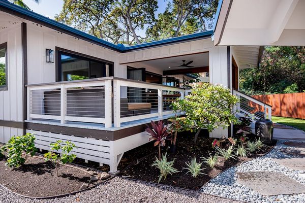 Exterior View of Raised Deck, Covered Lanai & Landscaped Yard