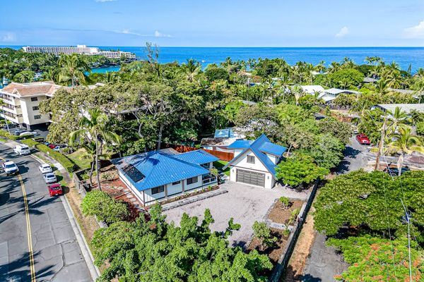 Panoramic Aerial View of Property, Lush Tropical Surroundings & Ocean Horizon
