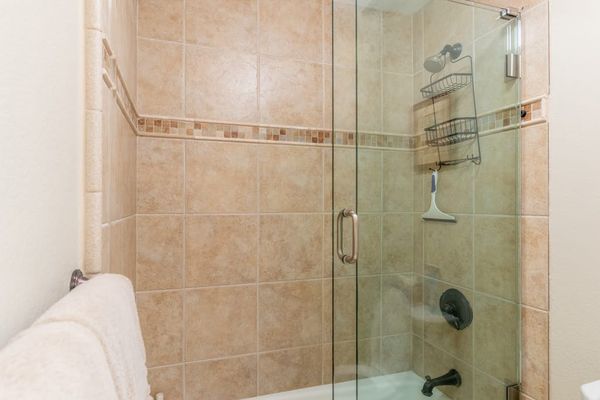 Modern Walk-In Glass Shower & Tiled Bathroom