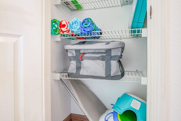 Convenient Laundry Closet With Essentials