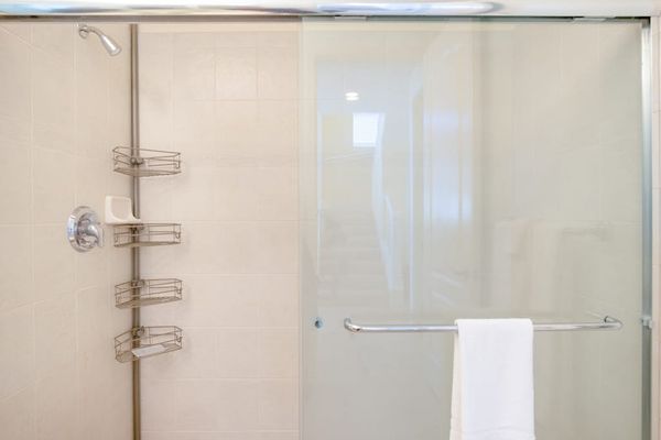 Glass Walk-In Shower with Built-In Storage & Showerhead
