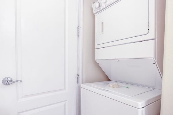 In-Unit Stacked Washer & Dryer for Guest Convenience