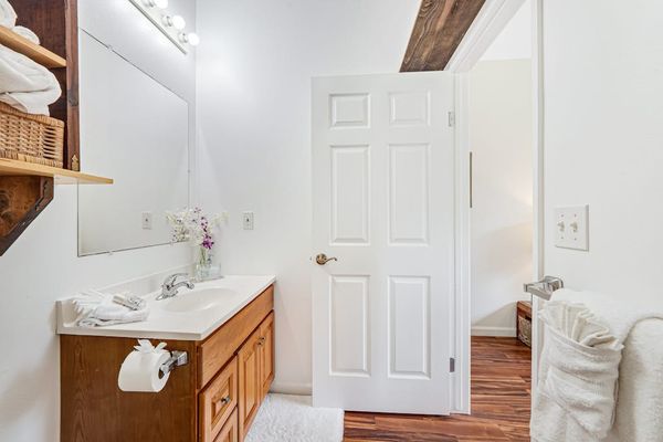 Full bathroom with tub/shower combo.