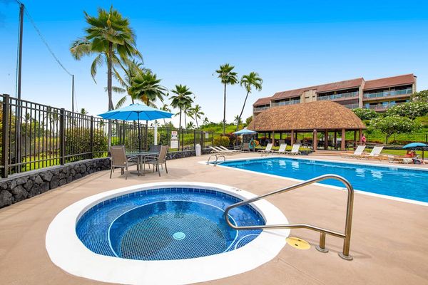 Resort Pool With Relaxing Hot Tub