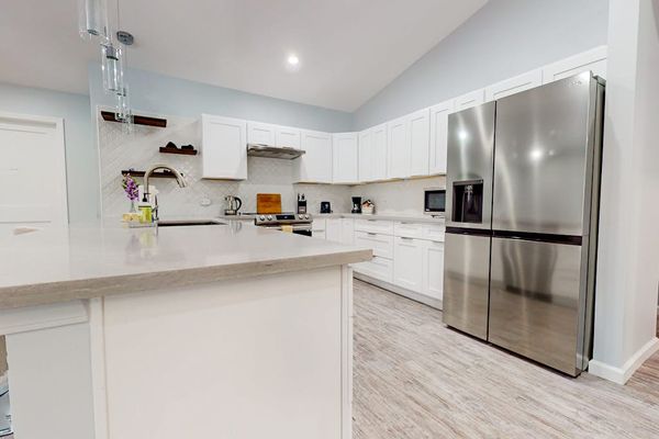 A well-appointed kitchen boasts modern appliances,  create hearty breakfasts or quick snacks with ease.