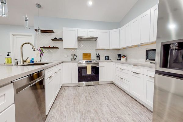 A well-appointed kitchen boasts modern appliances,  create hearty breakfasts or quick snacks with ease.