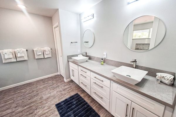 Master en-suite bathroom with double sinks and walk in shower.