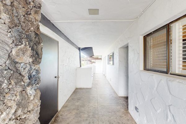 Comfortable full bathroom includes shower vanity mirror and bright finishes
