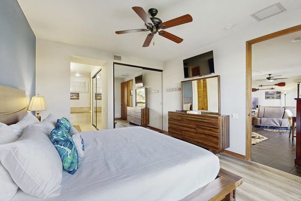 Soft natural light creates a relaxing bedroom atmosphere.