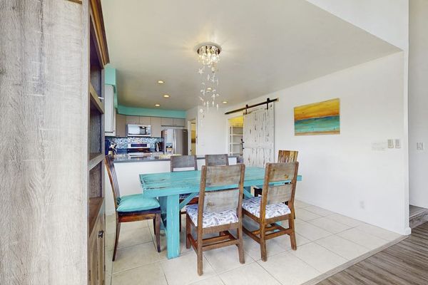 Dining room with seating for six.  Relax from the comfort of your home.