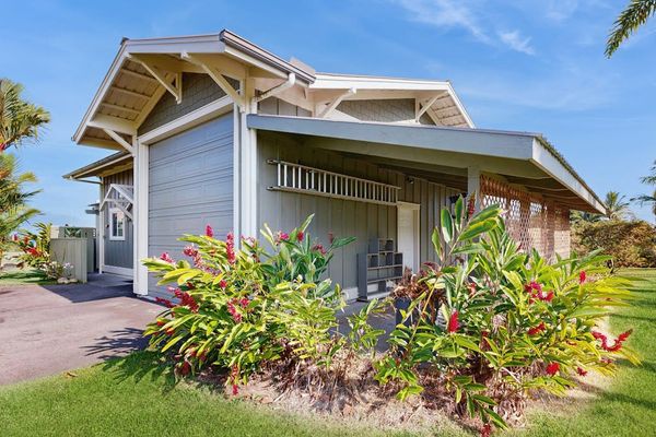 This exquisite one-bedroom apartment is nestled within a peaceful five-acre botanical estate, offering a serene retreat.