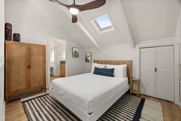 Modern loft bedroom with warm wood accents