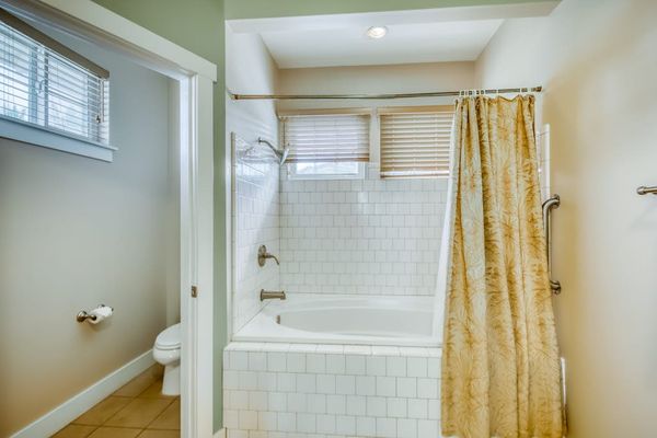 Clean & Bright Guest Bathroom with Shower & Soaking Tub Combo