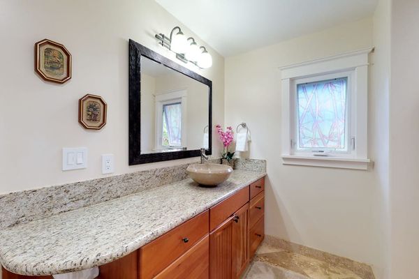 Guest bathroom with walk-in shower.