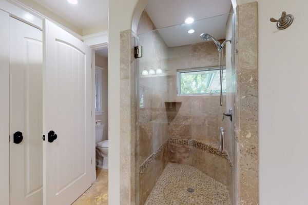 Guest bathroom with walk-in shower.