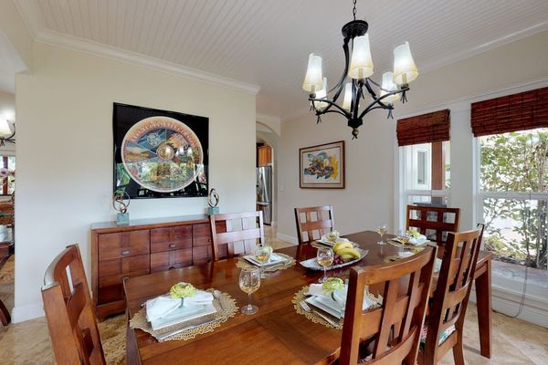Dining room table with seating for eight - another table for extra seating.