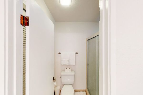 Full bathroom with walk in shower.
