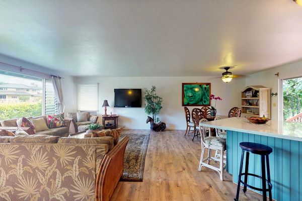 Barstools at the kitchen island for extra seating.