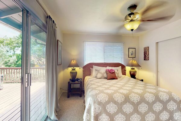 Master bathroom with king bed and an en-suite bathroom.