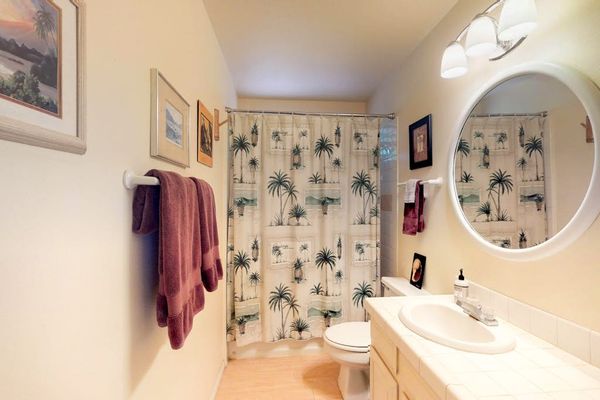 Guest bathroom with tub/shower combo.