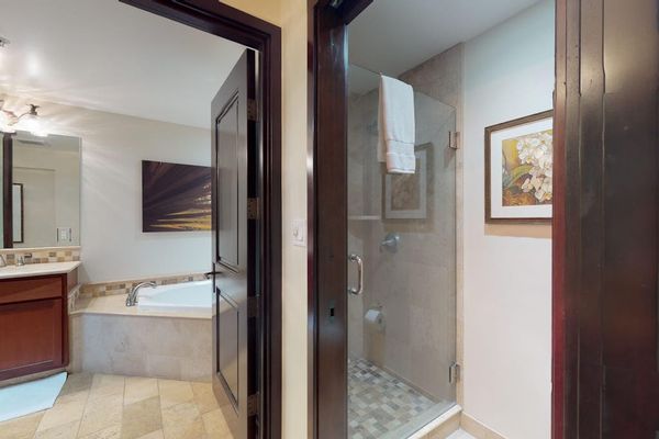 Spacious Guest Bathroom with Walk-In Shower & Soaking Tub