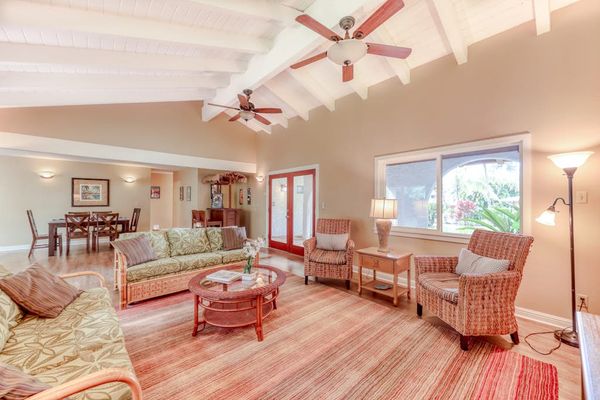 Sunlit Secondary Living Area with Wood-Beamed Ceilings