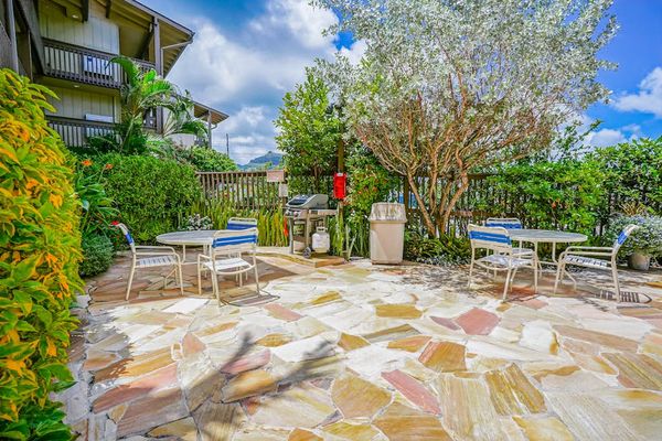 Spacious Backyard with Tropical Landscaping