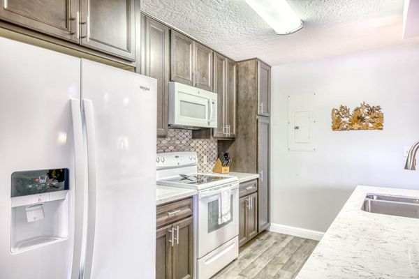 Modern Kitchen With Warm Wood Cabinetry